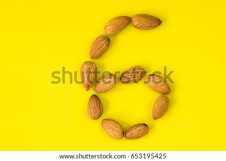 number six on yellow background
