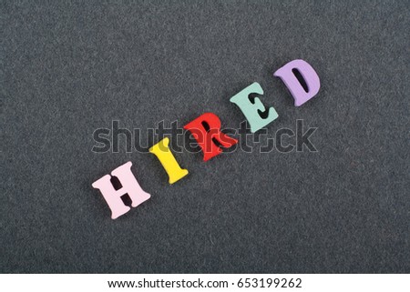 word on black board background composed from colorful abc alphabet block wooden letters, copy space for ad text. Learning english concept