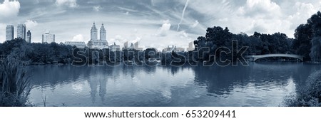 Central Park Spring with skyline panorama in midtown Manhattan New York City