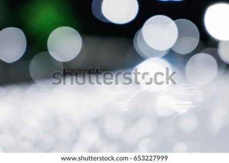 White bokeh lights defocused. abstract background