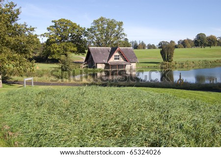 boat house on a river on a golf course