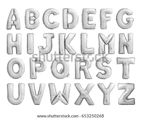 Full alphabet of silver metallic inflatable balloons isolated on white background