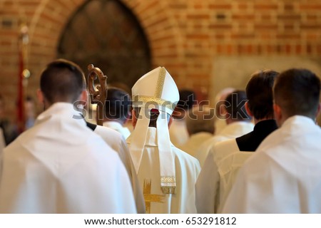 Bishop goes to Mass in the church
