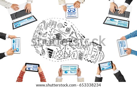 Group of people with devices in hands working together as symbol of networking and communication