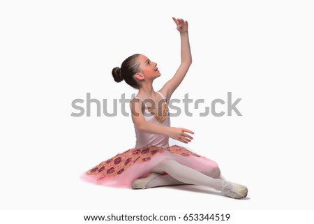 Beautiful girl ballet dancer. Isolated