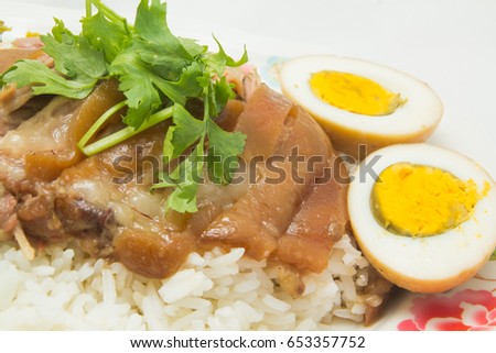 Rice with stewed pork leg and vegetable and duck egg