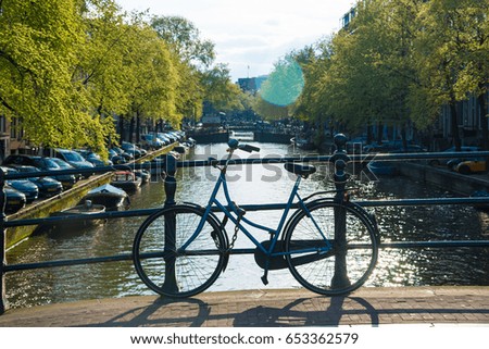 Bicycle on the bridge in Amsterdam, Netherlands.