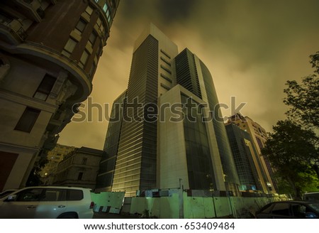 Night view of the city of Baku. Street buildings at night time. Downtown of the capital of Azerbaijan