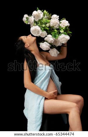 pregnant with roses on black background