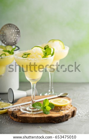 Refreshing summer margarita cocktail with fruits and hot pepper