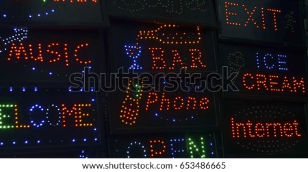 LED light signs display on Black background.