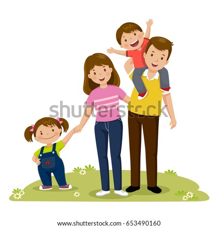 Portrait of four member happy family posing together. Parents with kids
