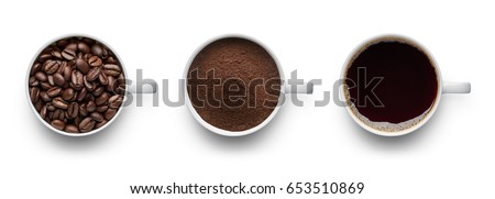 Coffee beans, ground coffee and cup of black coffee over white background Royalty-Free Stock Photo #653510869
