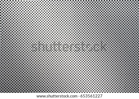 dot pattern of metal mesh filter  Royalty-Free Stock Photo #653561227