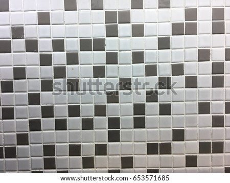 Tile Patterns of seamless grey square to showcase your wall