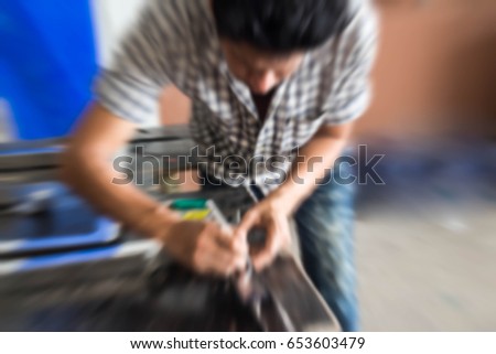 Blurry portrait of construction worker on building