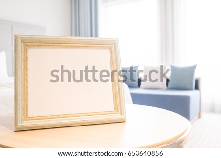 close up photo frame on table in the home