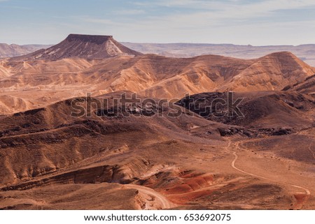 Sunset in the Negev desert. Makhtesh Ramon Crater. Israel Royalty-Free Stock Photo #653692075