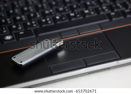 flash drive put on a laptop