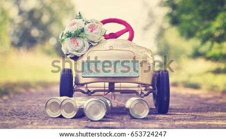  honeymoon car, pedal car with wedding decoration                                             Royalty-Free Stock Photo #653724247