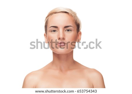 Woman with natural light makeup on white background in studio photo. Clean healthy portrait