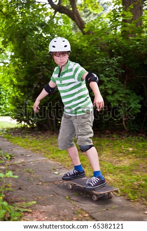 young boy on his skate board