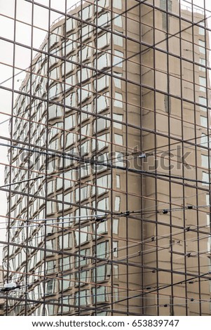 Building Reflected in Glass Wall in Vancouver