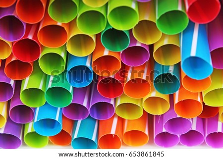 Fancy straw art background. Abstract wallpaper of colored fancy straws. Rainbow colored colorful pattern texture. Fancy straws.