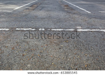 Lines on the asphalt of a parking