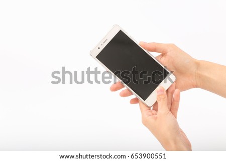 Female hands on a white background with a phone