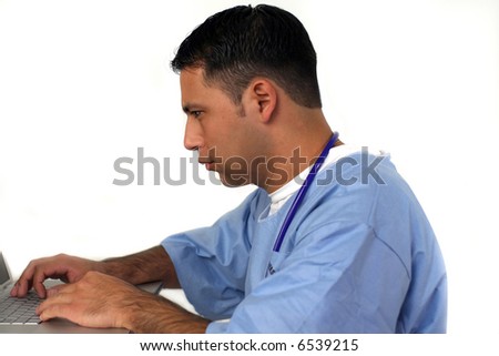 Hispanic Medical Worker using a computer