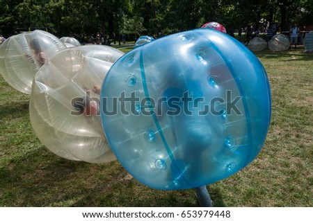 Teenagers play in Bubble bump