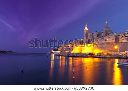 Valletta Skyline at night with church of Our Lady of Mount Carmel and St. Paul's Anglican Pro-Cathedral, Valletta, capital city of Malta