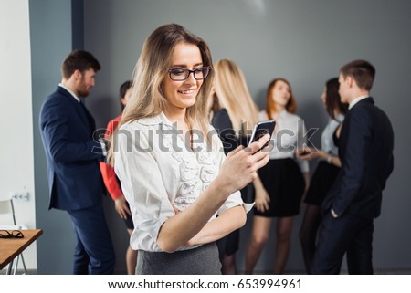 Business woman portrait with phone