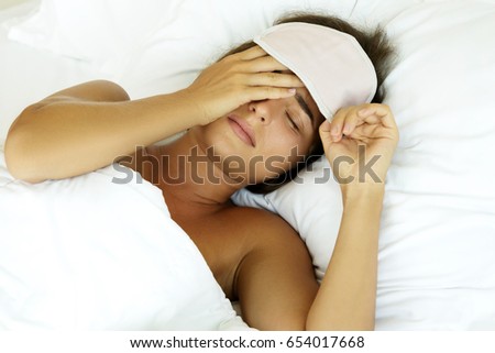 Woman is feeling bad after not enough sleeping