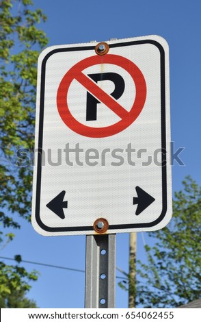 No parking on both sides signpost
