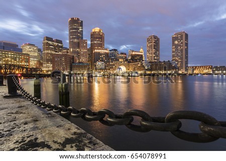 The Boston skyline at night, located in Fan Pier Park, Boston, Massachusetts, USA
