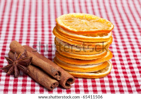Dried Orange with cinnamon and anise on chequered cloth