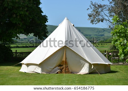 Traditional cotton canvas bell tent near the South Downs Royalty-Free Stock Photo #654186775