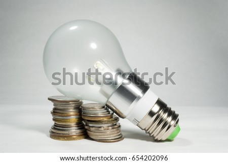 Led bulb world currencies, energy and economy