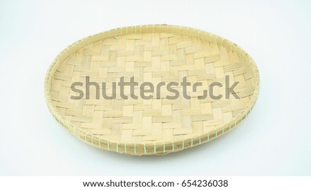 Weaving craft tray made of pine on white background.  Royalty-Free Stock Photo #654236038