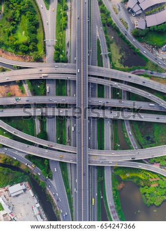 Elevated expressway. The curve of suspension bridge, Thailand. Aerial view. Top view. Background scenic road.