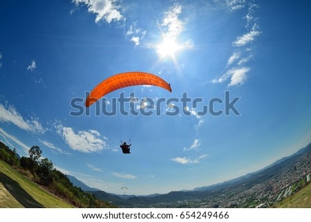 Para-glider in sunny day flying in Puli, Taiwan