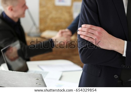 Hands of businessman at workplace crossed on chest. White collar worker at workspace shake hands, exchange market, job offer, certified public accountant, internal Revenue officer concept
