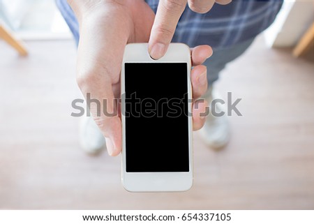 Flat lay hand using phone white screen on top view.clipping path inside