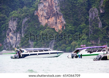 Fishing boat in Phi Phi island , Thailand. Royalty-Free Stock Photo #654366709