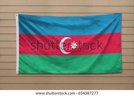 Azerbaijan flag hanging on a wall