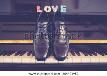Grooms Shoes on Piano