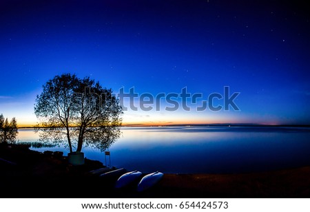 Sunset river landscape. River sunset background Royalty-Free Stock Photo #654424573