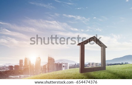 House stone figure as symbol of construction and real estate outdoors